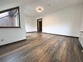 Gepflegte 3-Zimmer-Dachgeschosswohnung mit Stellplatz und Südbalkon - Wohnzimmer