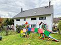 Neuwertiges Zweifamilienhaus in ruhiger Feldrandlage von Dorndiel mit Garten, Kamine und viel Platz! - Rückansicht II