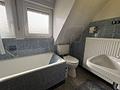 Doppelhaushälfte mit Wintergarten, Garage und Stellplatz in ruhiger Wohnlage - Badezimmer