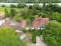 Historische Eleganz trifft auf zeitlose Exklusivität - außergewöhnliches Anwesen am Main - Luftbild 2