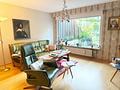 Dieses Eigenheim in von Neu-Anspach wartet auf eine Familie! - Wohnzimmer