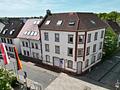 Attraktives Wohn- und Geschäftshaus mit Entwicklungspotenzial in zentraler Lage von Heusenstamm - Hausansicht