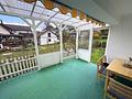 Gepflegtes Ein- / Zweifamilienhaus mit Doppelgarage, Terrasse, und großem Garten - Terrasse 