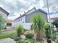 Wohnen und Wohlfühlen - schicke Doppelhaushälfte mit Wintergarten, Terrasse und grünem Rückzugsort - Außenansicht