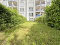 2-Zimmer-Wohnung im Erdgeschoss mit Terrasse, Garten und Tiefgarage in Dietzenbach! - Rückansicht Wohnung