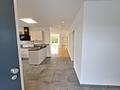 Willkommen in ihrem Traumhaus -                  
modernes und ebenerdiges  
Wohnkonzept für die kleine Familie - Blick ins Haus