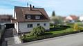 Großzügiges Wohnhaus mit zwei separaten 3- Zimmer-Wohnungen, Süd-West-Garten und Garage - Außenansicht