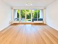 Außergewöhnliche 4-Zimmer-Wohnung mit Garten, Terrasse & Balkon in guter Lage von Bockenheim - Wohnzimmer