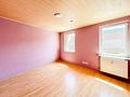 Zwei Wohneinheiten, Gartenanteil und drei Garagen – Wohnhaus in Kirchzell - OG_Schlafzimmer