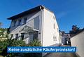 Gutes Mehrfamilienhaus in Rüsselsheim: Attraktive Investitionsmöglichkeit mit Mietpotenzial - Hausansicht 1