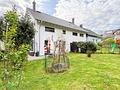 Neuwertiges Zweifamilienhaus in ruhiger Feldrandlage von Dorndiel mit Garten, Kamine und viel Platz! - Rückansicht I