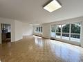 Hochwertige 3-Zimmer-Wohnung mit TG-Stellplatz und Gemeinschafts-Garten - Wohnzimmer
