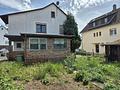 Charmantes Einfamilienhaus mit großem Grundstück und viel Potenzial - Rückansicht