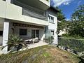 Familienfreundliche 4-Zimmer-Eigentumswohnung mit Terrasse, Gartenanteil, Garage und Keller - Terrasse mit Garten