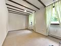 Wohnen mit Perspektive: Zweifamilienhaus mit Garten und zusätzlicher Bauoption in Groß-Umstadt - Zimmer 1 EG
