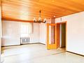 Ein Zuhause mit vielen Möglichkeiten – großzügiges Wohnhaus mit Garten und zwei Garagen - OG_Wohnzimmer