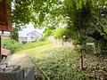 Zwei Wohneinheiten, Gartenanteil und drei Garagen – Wohnhaus in Kirchzell - Garten