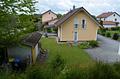Baugrundstück mit energieeffizientem Einfamilienhaus und weiterer Bebauungsmöglichkeit - Hanggrundstück