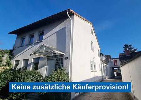 Gutes Mehrfamilienhaus in Rüsselsheim: Attraktive Investitionsmöglichkeit mit Mietpotenzial - Hausansicht 1