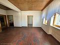Großzügiges Einfamilienhaus mit viel Potenzial in guter Lage von Rodgau – sanierungsbedürftig - 1. OG Wohnzimmer 