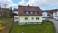 Gepflegtes Ein- / Zweifamilienhaus mit Doppelgarage, Terrasse, und großem Garten - Außenansicht