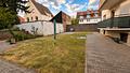 5-Zimmer Eigentumswohnung im 2. Obergeschoss mit Balkon - ca. 100 m² Wohnfläche -  in Rüsselsheim - Gemeinschaftsgarten