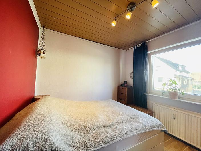 Gut geschnittene 3-Zimmerwohnung mit Terrasse, Garten und Stellplatz in Büttelborn - Worfelden - Schlafzimmer