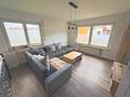Gepflegtes Ein- / Zweifamilienhaus mit Doppelgarage, Terrasse, und großem Garten - Wohnzimmer EG