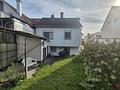 Charmantes Einfamilienhaus mit Garage, Nebengebäude und viel Potenzial in Nidderau-Heldenbergen - Rückansicht