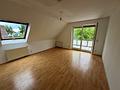 Attraktive Eigentumswohnung mit Garage und Balkon - Wohnzimmer