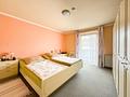Mit Weitblick wohnen – gepflegtes Einfamilienhaus mit Einliegerwohnung und Ausbaureserve - EG_Schlafzimmer