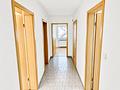 3-Familienhaus mit freier Dachgeschosswohnung, Doppelgarage & Garten - Flur im DG