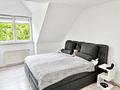 Gepflegte Maisonette-Eigentumswohnung mit 
Einbauküche, Garagenstellplatz, 2 Bäder & Balkon - Schlafzimmer unten