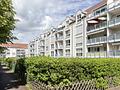 2-Zimmer-Wohnung im Erdgeschoss mit Terrasse, Garten und Tiefgarage in Dietzenbach! - Rückansicht Wohnanlage