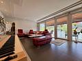 Natur vor der Tür, der Ortskern nur wenige Minuten entfernt – 4-Zimmer-Wohnung mit Balkon und Garten - Wohnzimmer