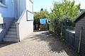 Freistehendes Einfamilienhaus mit Garage u. wunderbarem Garten in guter Lage von Bad Soden-Neuenhain - Einfahrt und Eingang