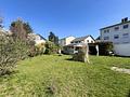 Freundliches Einfamilienhaus mit großzügigem Grundstück und Ausbaupotenzial - Gartenansicht