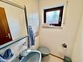 Stilvolles Einfamilienhaus mit Split-Level-Charakter,
Terrasse, Garten & Garage in begehrter Lage - Gäste-WC im EG