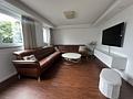Exklusive Doppelhaushälfte mit Premium-Ausstattung, Doppelgarage und traumhaftem Garten - Wohnzimmer