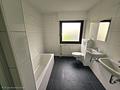 Voll vermietetes Büro- und Mehrfamilienhaus in Top-Gewerbelage Oberursel - EG Bad
