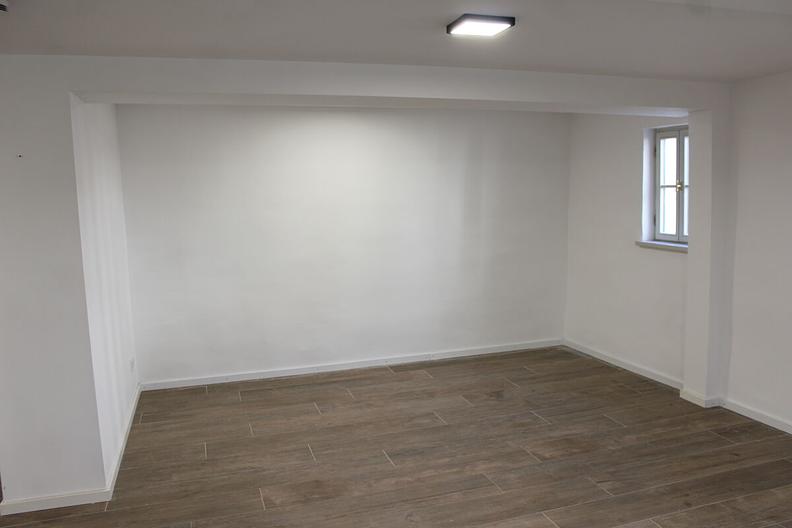 Neuwertiges Einfamilienhaus mit Aufzug und zwei Tiefgaragenstellplätzen in Toplage am Quellenpark - Wohnbereich