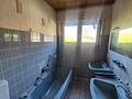 Klein-Karben Bungalow in ruhiger Lage – großzügiges Grundstück und viel Potenzial für Ihre Ideen - Tageslichtbad