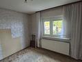 Charmantes Einfamilienhaus mit Garage, Nebengebäude und viel Potenzial in Nidderau-Heldenbergen - Schlafzimmer