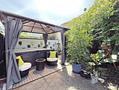 Gepflegte Doppelhaushälfte mit Charme im Zentrum von Markt Schwaben - Terrasse mit Garten