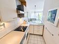 Exklusive 1-Zimmer-Wohnung mit Balkon, Skylineblick & TG-Stellplatz in Bestlage Bockenheim - Küche
