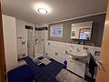Bürogebäude mit Lagerhalle und Wohneinheit - Badezimmer im UG