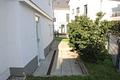 Neuwertiges Einfamilienhaus mit Aufzug, barrierefrei und zwei Tiefgaragenstellplätzen in Toplage am Quellenpark - Terrasse