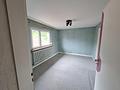 Vielseitig nutzbares Wohnhaus mit Garten & Garage - Wohnzimmer Obgeschoss