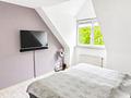 Gepflegte Maisonette-Eigentumswohnung mit 
Einbauküche, Garagenstellplatz, 2 Bäder & Balkon - Schlafzimmer unten