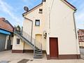 Vielseitiges Wohn- und Gewerbeensemble in Frankfurt-Schwanheim - Seitenansicht Haus 2